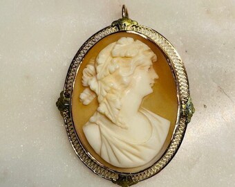Hand carved Cameo Pendant in 14 Karat Rose Gold filigree with Green Gold accented frame