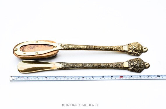 Antique Brass Shoe Horn and Clothing Brush With Lion Handles  display picture 3