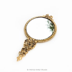 1920s Antique French Miniature Gilt Hand Pocket Mirror with Ribbon Bow and Floral Handle | Vintage Ornate Small Vanity Double Sided Mirror
