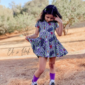 Girl’s “beetle juice” twirl dress