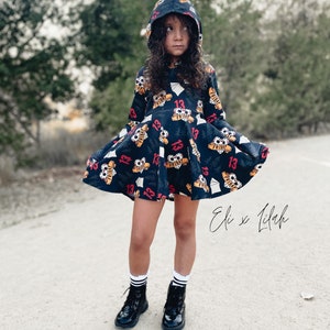 Girl’s “13th” hooded twirl dress
