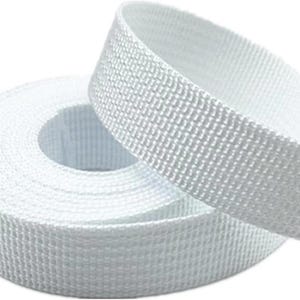 May include: A roll of white woven webbing, with a separate length of the same material unrolled. The webbing has a textured surface and appears to be made of a durable, possibly synthetic, material. The image is well-lit.