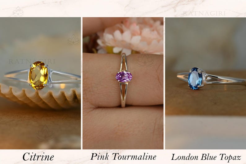 May include: Three rings with oval gemstones: a yellow citrine, a pink tourmaline, and a London blue topaz. Each ring has a silver band. The text below the rings reads "Citrine", "Pink Tourmaline", and "London Blue Topaz".