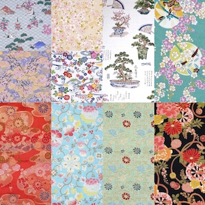 May include: A collection of twelve fabric swatches featuring diverse patterns including cherry blossoms, bonsai trees, traditional fans, and intricate floral motifs in vibrant colors like red, blue, green, black, and gold on various textile backgrounds.