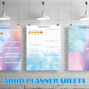 May include: Three printable planner sheets with a watercolour background. The sheets are labelled "Daily Planner" and "Weekly Planner". The daily planner sheets include sections for mood, appointments, exercise, medications, important tasks to do, today's goals, and water intake. The weekly planner sheet includes sections for Monday through Sunday, important/urgent tasks, habit tracker, and goals/brain dump.