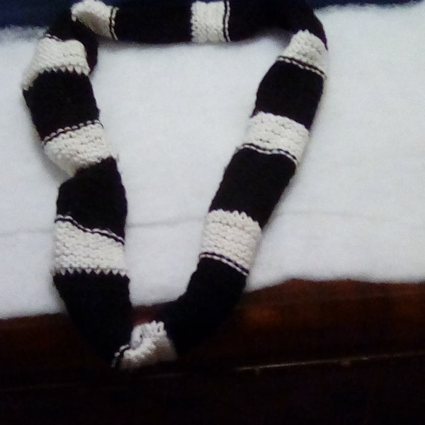 Black and white knitted scarf