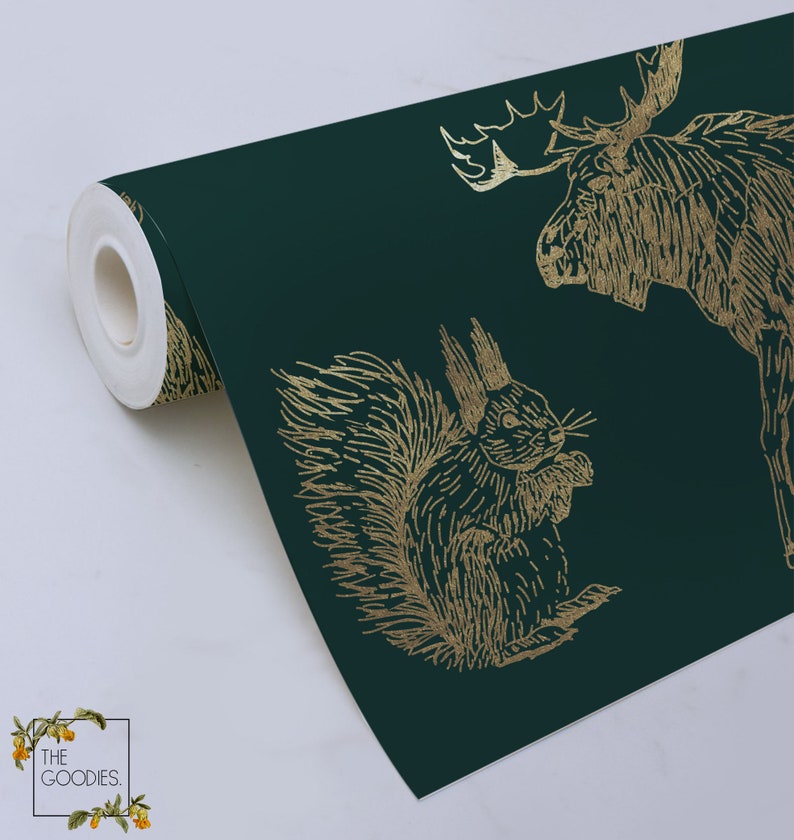 May include: A roll of dark green wallpaper with a gold foil pattern of a moose and a squirrel. The wallpaper is rolled up and the end of the roll is visible.