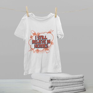 T shirt - Comic Inspired Quote - I Still Believe in Heroes