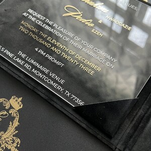 May include: A black and gold wedding invitation with the text "Together with their families, Sontichahve Pedro & Ezeh Nwaogazie Request the pleasure of your company at the celebration of their marriage on Monday, the eleventh of December two thousand and twenty three 4 PM Prompt The Luminaire Venue 5 Pine Lake Rd, Montgomery, TX 77356"