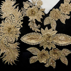Puede incluir: Apliques de encaje de brillo dorado con diseños florales y de hojas. Estos adornos son perfectos para agregar un toque de brillo a la ropa, los accesorios o los proyectos de decoración del hogar.