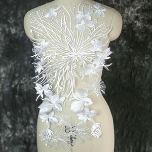 Toppa in pizzo ricamato con paillettes trasparenti con applicazioni floreali bianche per abito da sposa