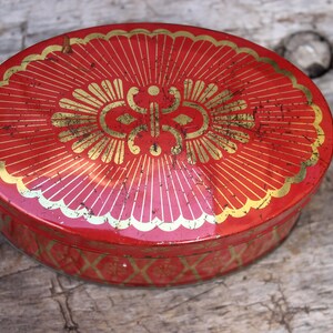 oval tin can red gold 30s 40s