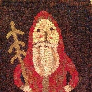 May include: A hand-hooked rug depicting a Santa Claus figure in a red robe holding a brown walking stick. The background is a dark brown color. The rug is signed "Star Rug Company".