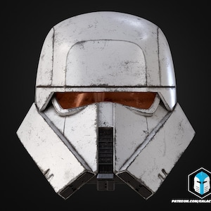 May include: A weathered white and gray helmet with orange-tinted eye protection. The helmet has a geometric design with visible wear and tear, suggesting a battle-worn aesthetic. The overall design is reminiscent of science fiction or military gear.