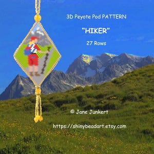 May include: A diamond-shaped 3D peyote pod ornament featuring a hiker graphic with a red hat, blue backpack, and red pants. The ornament has yellow bead accents and a yellow tassel. Text reads: 3D Peyote Pod PATTERN, HIKER, 27 Rows.