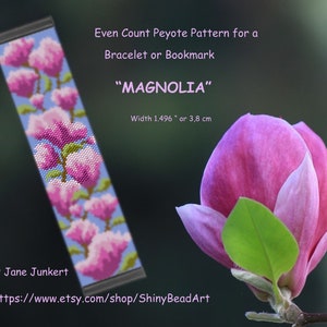 May include: A beading pattern for a bracelet or bookmark featuring a pink magnolia flower design. The pattern is called "MAGNOLIA" and is 1.496 inches or 3.8 cm wide.