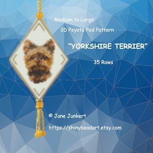 May include: A white diamond-shaped beading pattern chart with a brown and tan Yorkshire Terrier dog image in the centre. The chart is for a 3D peyote pod pattern and is medium to large in size. The chart is 35 rows and includes the text "Yorkshire Terrier".