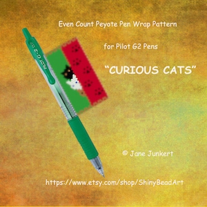 May include: A green Pilot G2 pen with a peyote stitch pen wrap pattern featuring a cat design. The pattern is called "CURIOUS CATS".