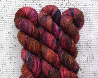 Garnet - OOAK hand dyed luxury sock yarn - superwash merino cashmere nylon - red