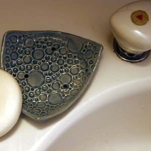 Sandstone soap holder with drain holes and feet