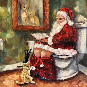 May include: An oil painting depicts Santa Claus in a red suit and hat, seated on a toilet, reading. A framed picture of cats hangs on the wall. A cat and a dog are also in the scene.