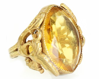 Art Deco Czechoslovakian Yellow Glass Winged Merlion Filigree Statement Ring in Gilt on Brass Size 4