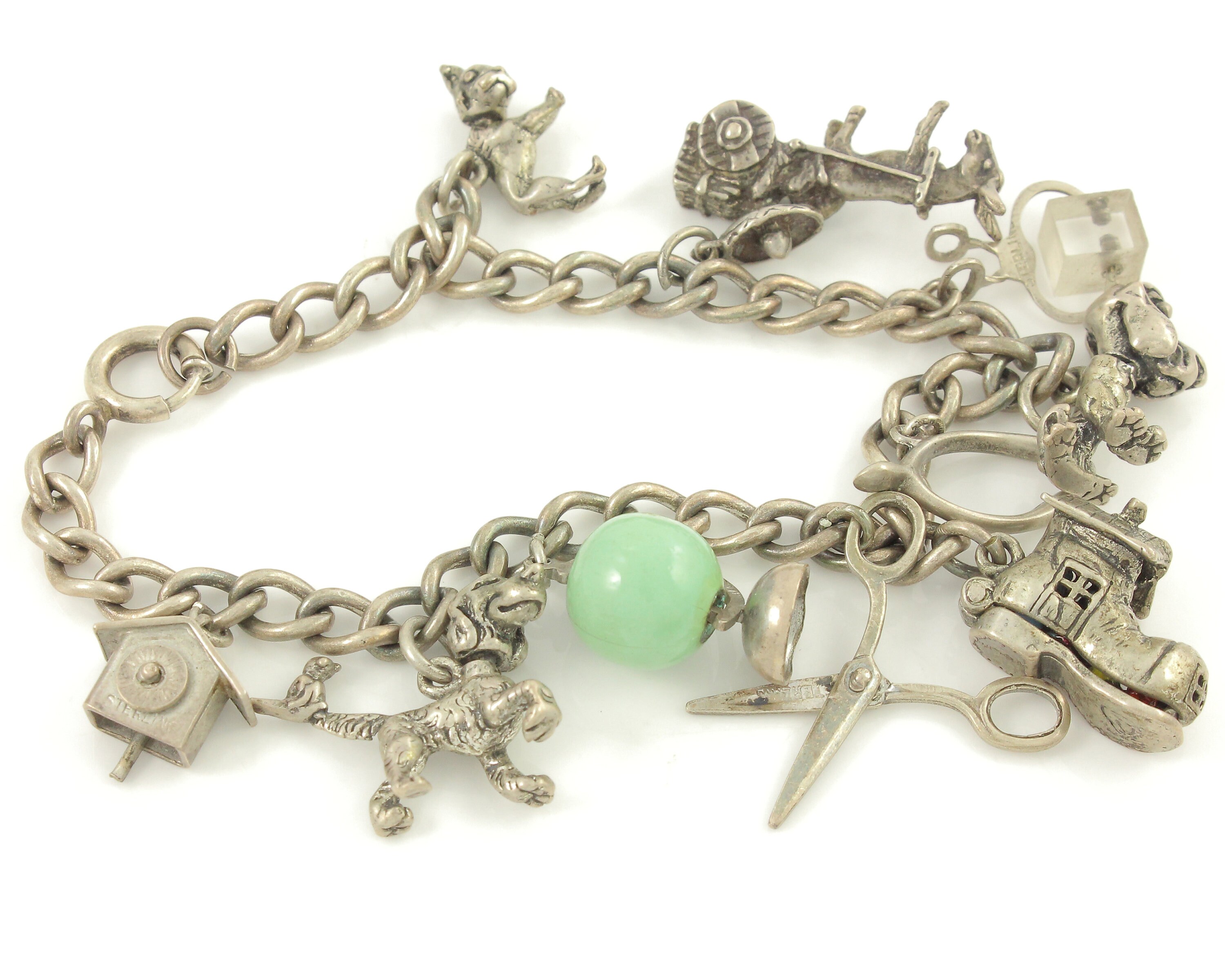 Sterling Silver Charm Bracelet with 12 Charms, Safety Clasp, Mid Century, 1960's Vintage, Fun to Wear, Instant History, Excellent Condition