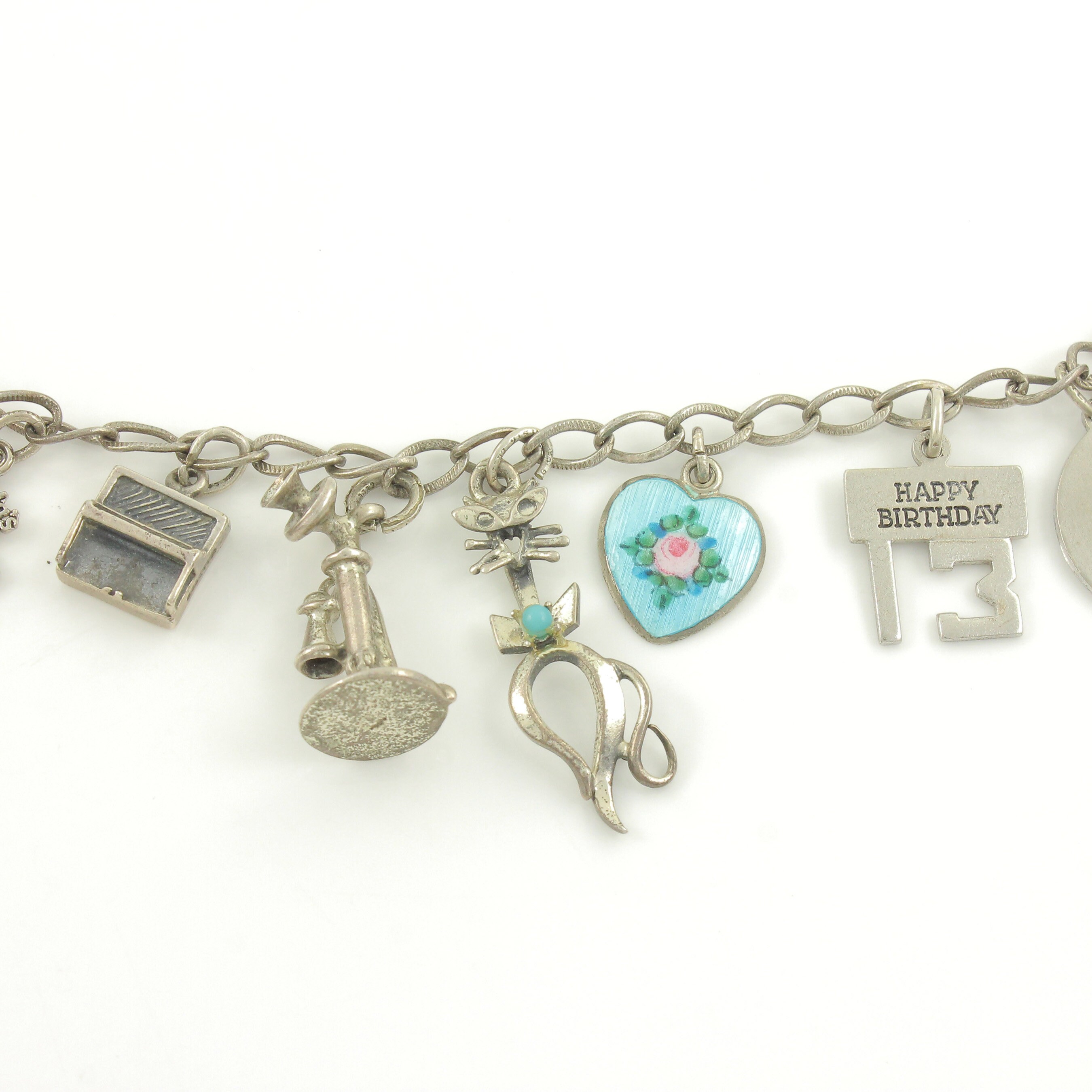 STERLING CHARM BRACELET 18 CHARMS 1960s (item #1159315)