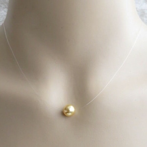 Floating Illusion Necklace with A 8mm Gold Swarovski Crystal Pearl Pendant. Transparent Invisible Necklace.