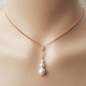 AB Crystal & White Preciosa Pearl Pendant Rose Gold Plated Necklace. White Pearl And AB Crystal Pendant On Rose Gold plated Chain.
