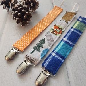 Forest friends pacifier clip set