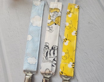 Winnie the pooh themed pacifier clip set