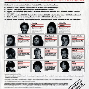 May include: A black and white poster with the text "Total of DM 4 million in rewards" and a list of wanted terrorists with their photos and descriptions. The poster is from the German Federal Criminal Police Office (BKA) and is dated December 1986.