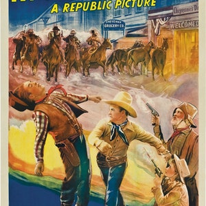 Op de afbeelding: Een vintage filmposter voor de westernfilm "In Old Cheyenne", met Roy Rogers en George "Gabby" Hayes. De poster toont een dramatische scène met cowboys in een vuurgevecht, met op de achtergrond een straat in een stad.
