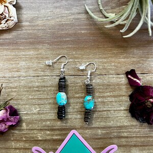 Green turquoise dangle earrings with brown shell