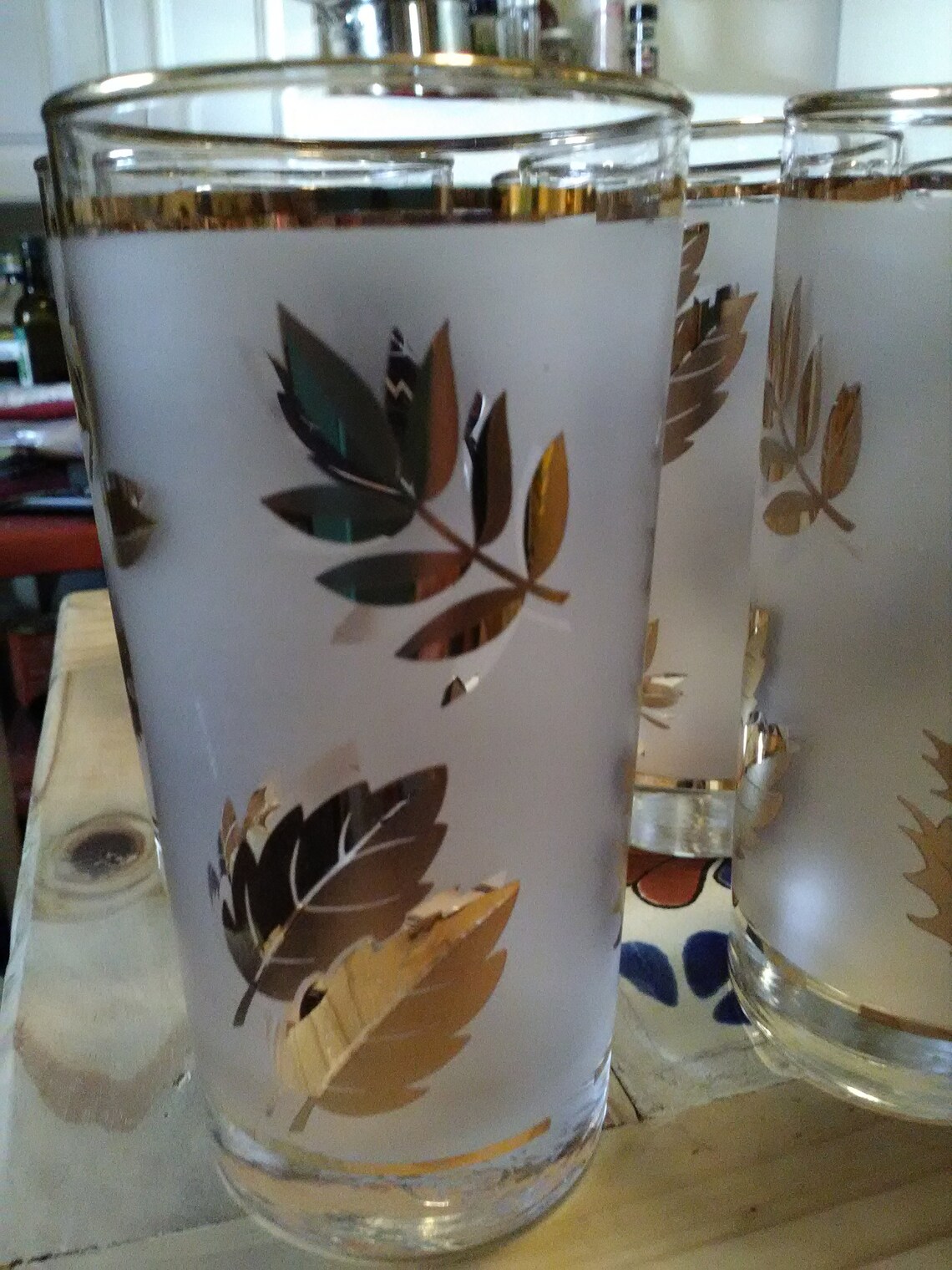 Nine gold leaf Libbey frosted 12 oz glasses plus... Etsy