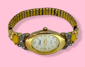 Vintage Vibra Quartz Watch Gold Tone Stretch Band Yellow Cabochon Rhinestone Accents