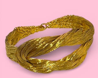 Pulsera trenzada de varias vueltas en tono dorado vintage: una atrevida declaración de alta costura de los 80