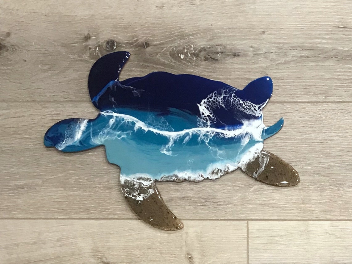 Sea turtle ocean resin art is made with many layers of glass like resin, bringing a new look to your wall.