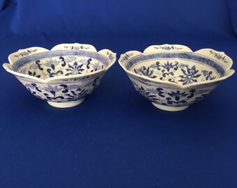 A Rare Pair of Early Blue and White Lotus Bowls