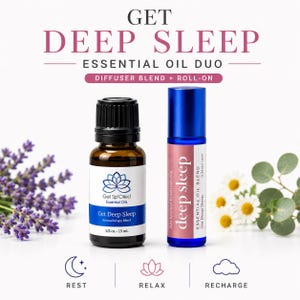 May include: A Get Deep Sleep essential oil duo featuring a 1/2 oz amber glass bottle with a black cap and a blue glass roll-on bottle with a blue cap. The labels display the text Get Deep Sleep, Get Sp'Oiled Essential Oils, and 0.34oz 10ml.