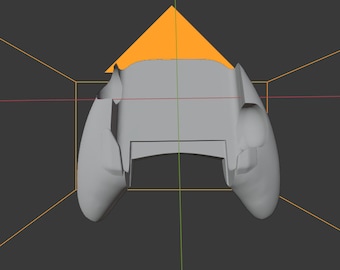 May include: A gray plastic video game controller with two buttons on each side and a large button in the center. The controller is missing some of its plastic casing.