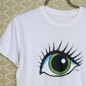 1970s graphic t shirt, white soft thin tee, Pop Art Seditionaries Boy London Andy Warhol skateboard New Wave Twilight Zone Boris Vallejo eye