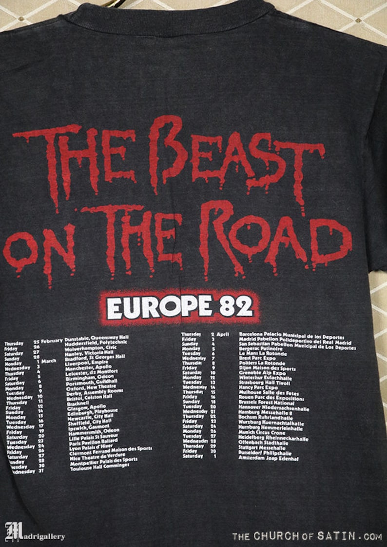 May include: Black t-shirt with a red print of "The Beast on the Road" and a tour schedule for Europe in 1982. The tour dates and locations are listed for February and April.