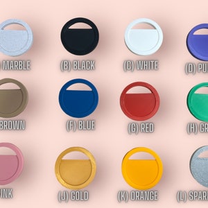 May include: Twelve round, flat, plastic discs in various colors, including marble, black, white, purple, brown, blue, red, green, pink, gold, orange, and sparkly gray. Each disc has a small, open circle cut out of the top.