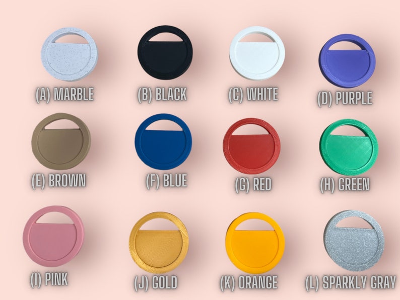 May include: Twelve round, flat, plastic discs in various colors, including marble, black, white, purple, brown, blue, red, green, pink, gold, orange, and sparkly gray. Each disc has a small, open circle cut out of the top.
