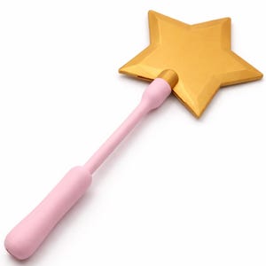 May include: A star-shaped wand with a gold star and a pink handle. The wand features a gold star and a pink handle. This wand is a fun accessory for costumes or imaginative play, perfect for children.