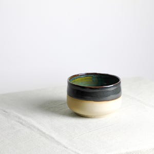 Handmade bowl (Ø 12 cm) made of ceramic in green and black-brown
