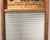 Antique Economy Brand Glass Washboard, Three Sad Iron Set, and Box Iron