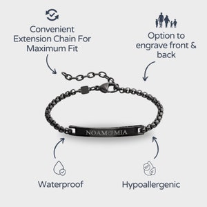 May include: Black chain bracelet with an engraved nameplate that reads "NOAMO&Mu;&Iota;&Alpha;". The bracelet has an extension chain for a custom fit and is waterproof and hypoallergenic.